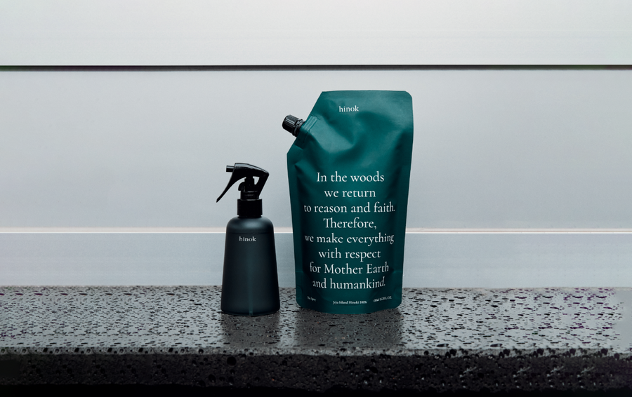 Hinok spray bottle and refill pouch with Jeju Hinoki Cypress, promoting mindful living and respect for Earth