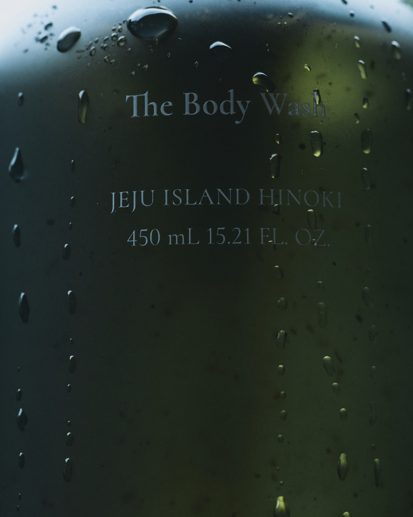 Water droplets on The Body Wash label
