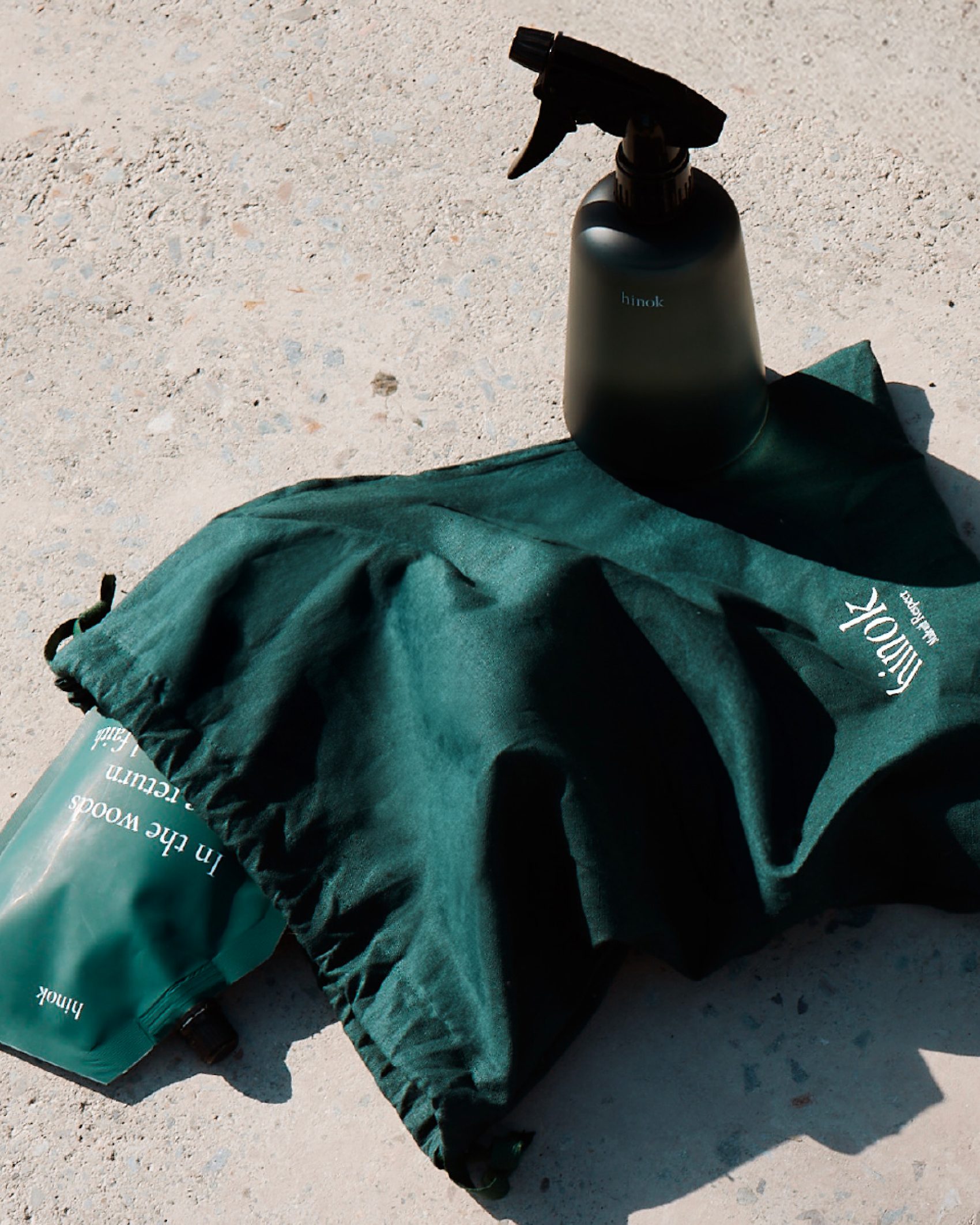 The Spray bottle on the reusable linen pouch