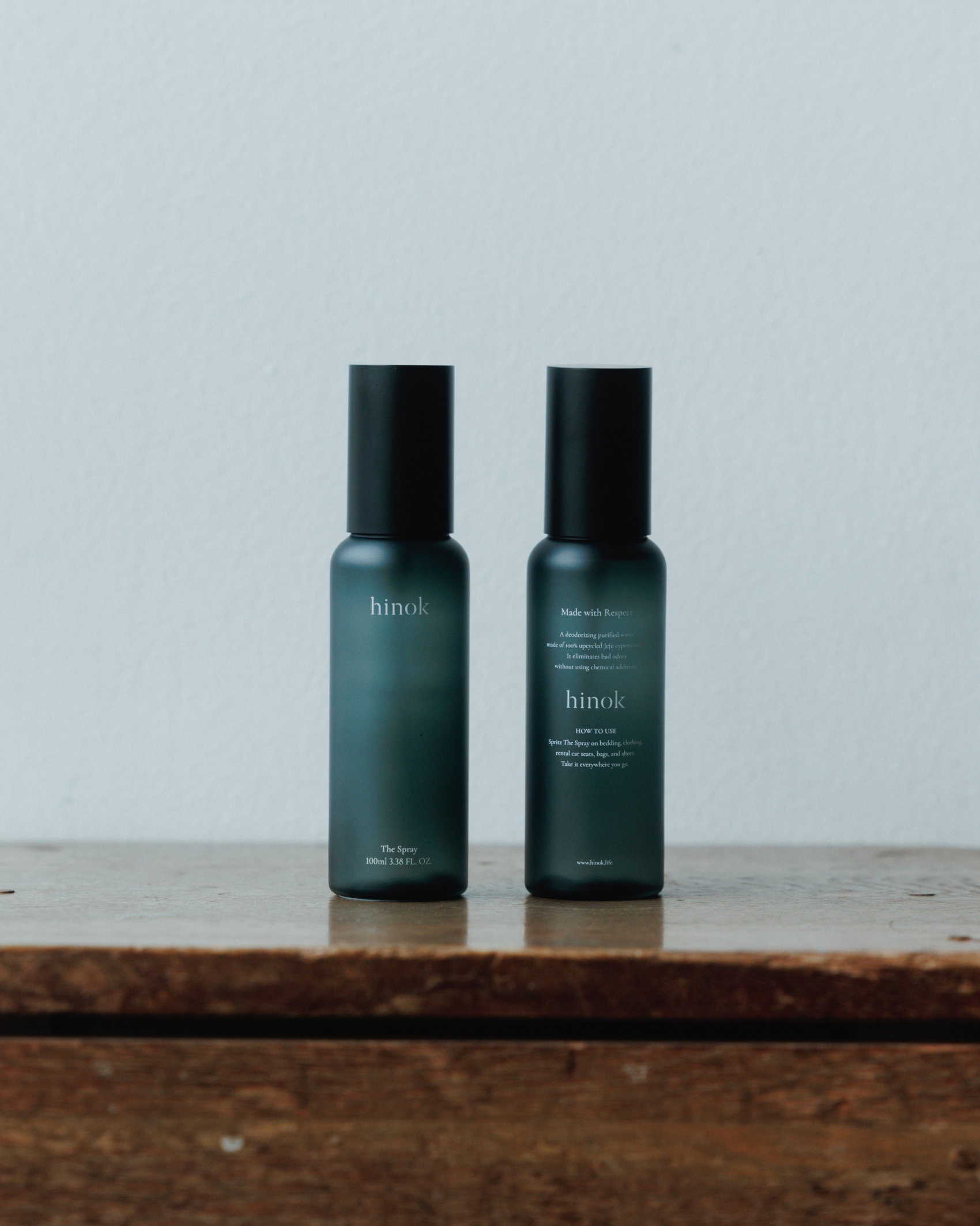 The Spray To Go bottles, front and back labels